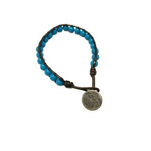 blue beaded bracelet with flower charm
